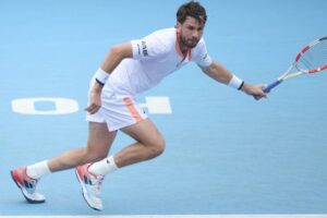 Korda odstúpil pre zranenie, Norrie postupuje